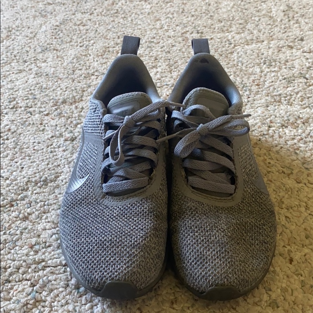 Grey Nike running shoes